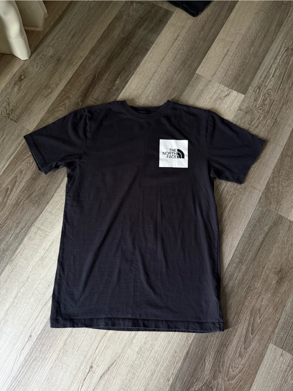 The North Face Black Crewneck T-Shirt with White Logo Patch